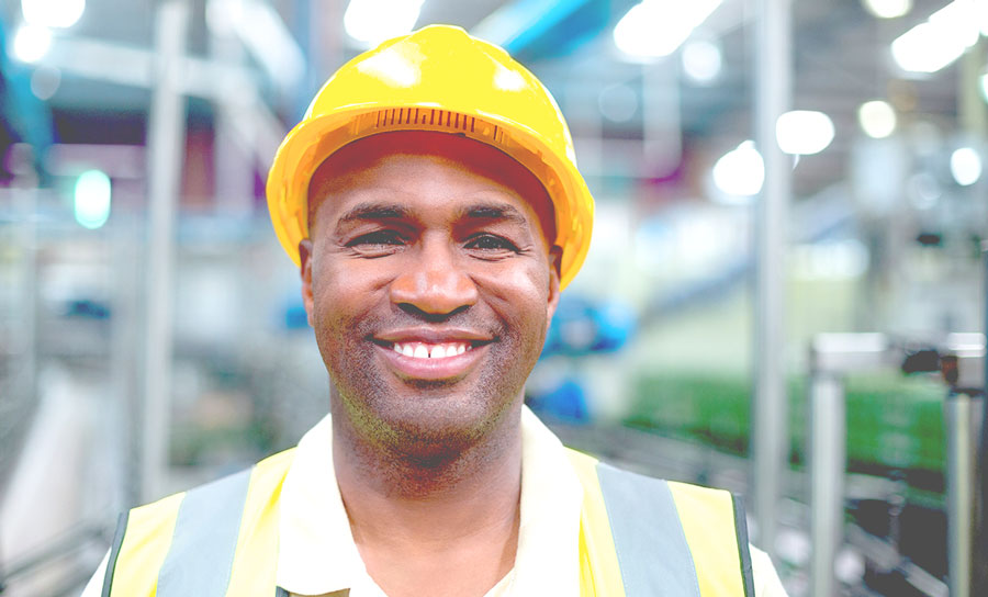 Man smiling at work.